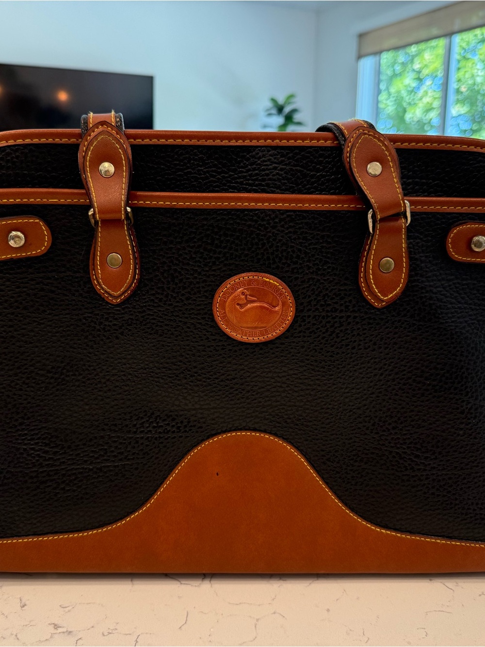 Dooney & Bourke Black Leather Shoulder Bag with Brown Trim